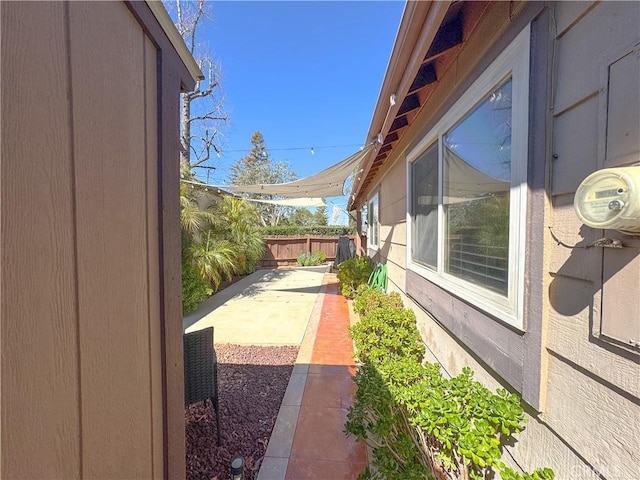 view of yard with a patio area and fence