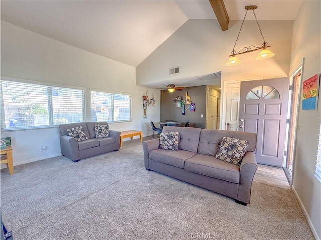 carpeted living area featuring high vaulted ceiling, visible vents, ceiling fan, and baseboards