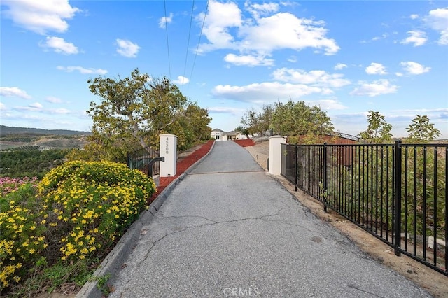 view of road with a gate