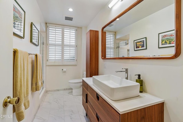 bathroom with toilet, recessed lighting, vanity, visible vents, and marble finish floor