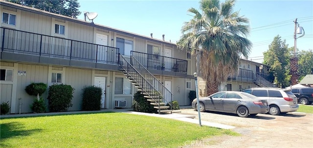 view of building exterior with stairs