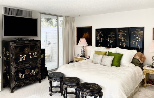 300 S Patencio Rd, Palm Springs, CA 92262 - bedroom with access to outside and carpet floors