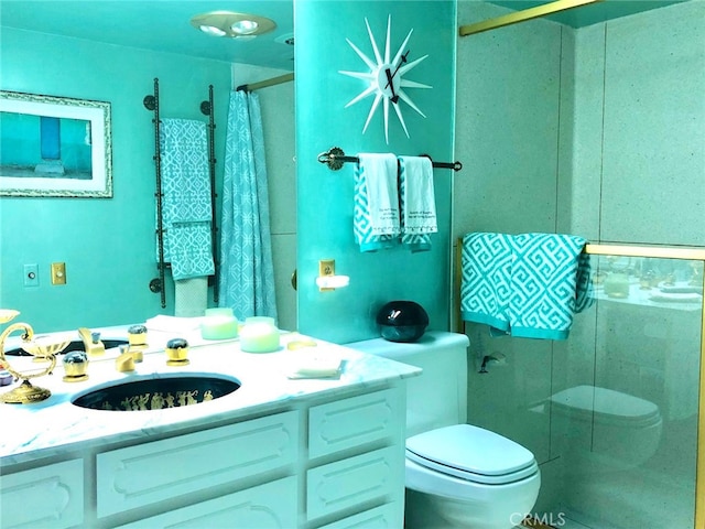 300 S Patencio Rd, Palm Springs, CA 92262 - bathroom featuring toilet, vanity, and a shower with shower curtain