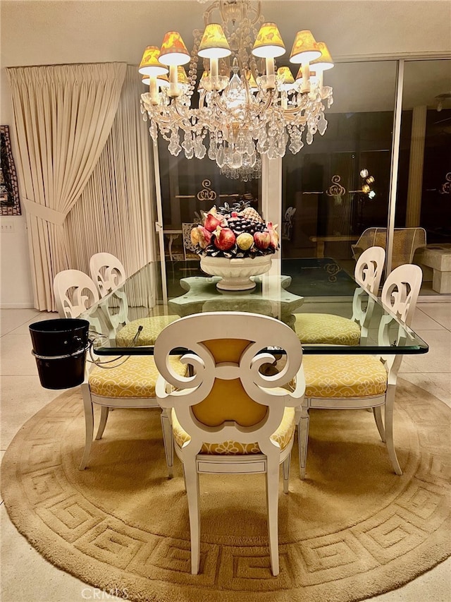 300 S Patencio Rd, Palm Springs, CA 92262 - dining space featuring a chandelier and tile patterned flooring