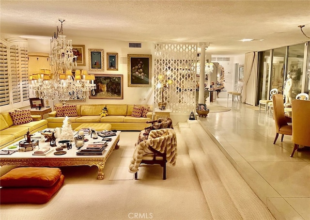300 S Patencio Rd, Palm Springs, CA 92262 - living area with tile patterned floors, a textured ceiling, and a chandelier