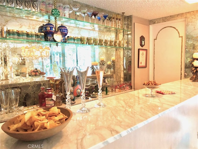 300 S Patencio Rd, Palm Springs, CA 92262 - dining area view of a textured ceiling and a community bar