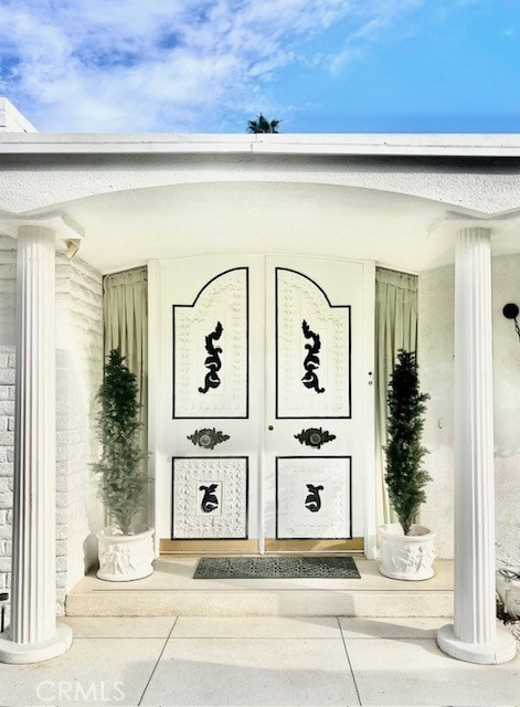 300 S Patencio Rd, Palm Springs, CA 92262 - doorway to property featuring a porch