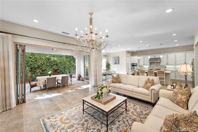 living room featuring visible vents and recessed lighting