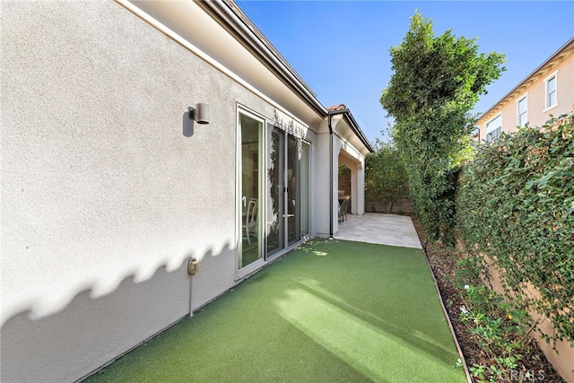 exterior space with a fenced backyard and a patio