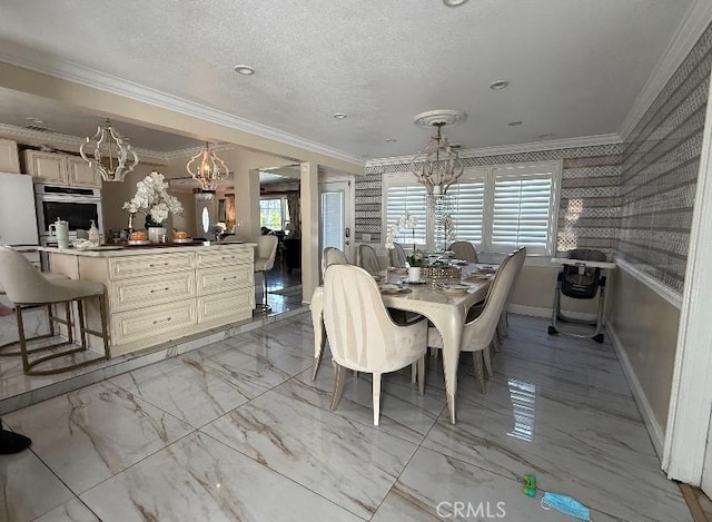 dining space featuring a chandelier, marble finish floor, a textured ceiling, and crown molding