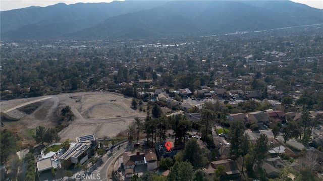 birds eye view of property featuring a residential view and a mountain view