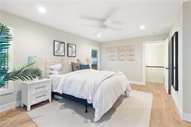 bedroom featuring light wood-style flooring, baseboards, ceiling fan, and recessed lighting