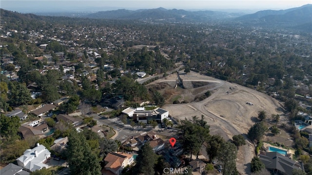 aerial view featuring a residential view and a mountain view