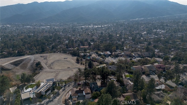 birds eye view of property with a residential view and a mountain view