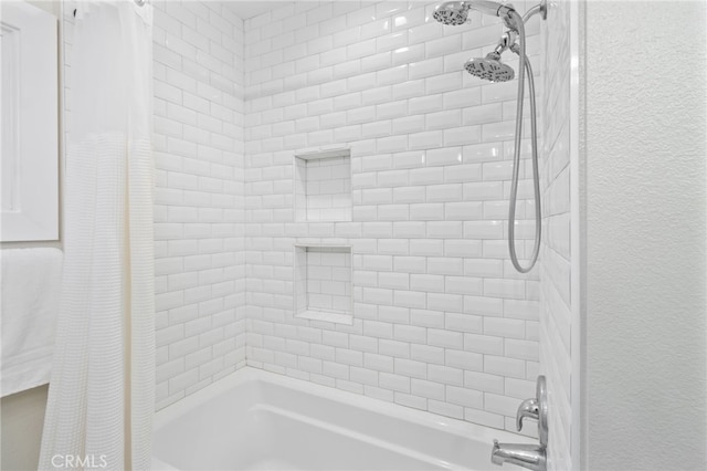 full bathroom featuring shower / tub combo with curtain