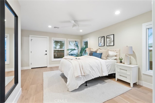 bedroom featuring recessed lighting, baseboards, visible vents, and light wood finished floors