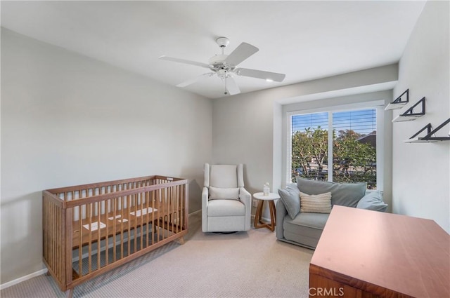 bedroom featuring ceiling fan, carpet floors, and baseboards