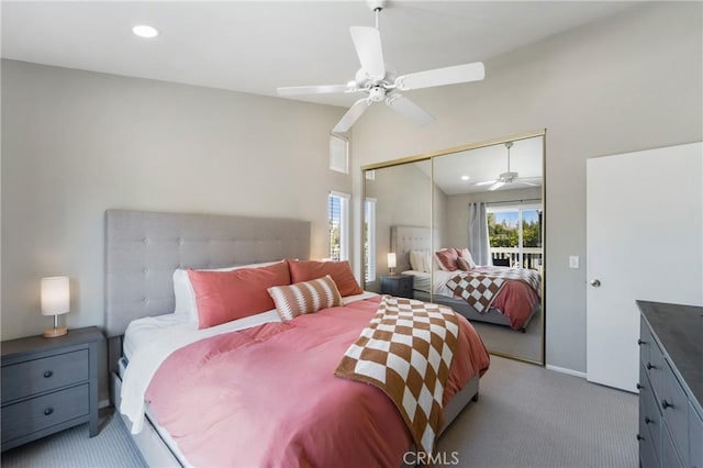 carpeted bedroom featuring lofted ceiling, a closet, recessed lighting, ceiling fan, and baseboards