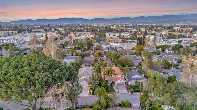 aerial view featuring a residential view and a mountain view