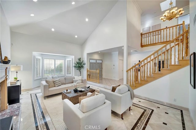 living area featuring baseboards, a chandelier, stairs, high vaulted ceiling, and recessed lighting