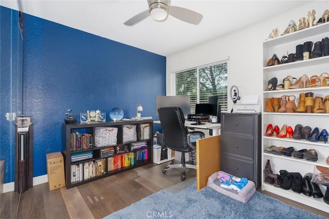 office space with dark wood-style flooring and a ceiling fan