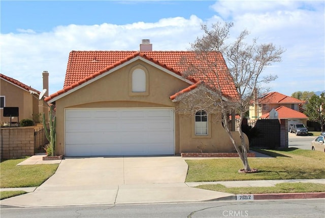 mediterranean / spanish-style house with concrete driveway, a tile roof, a chimney, and stucco siding