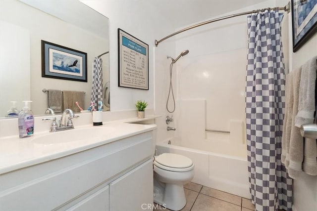 bathroom featuring toilet, vanity, shower / tub combo with curtain, and tile patterned floors