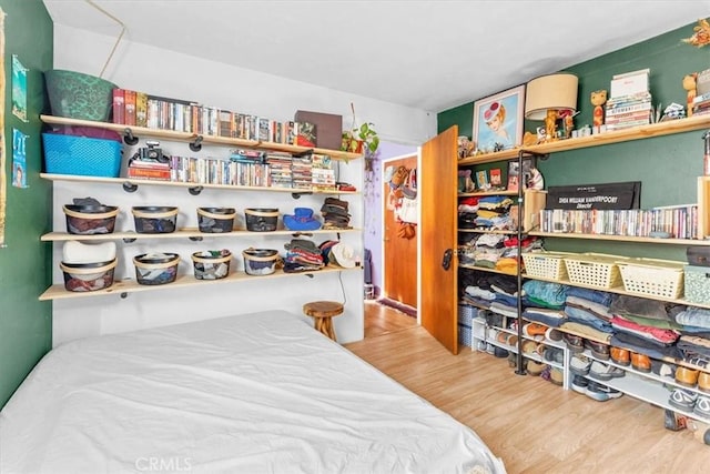 bedroom featuring wood finished floors