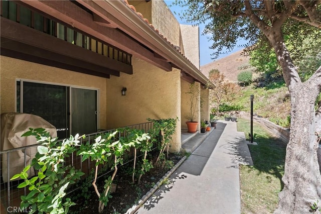 view of home's exterior with stucco siding