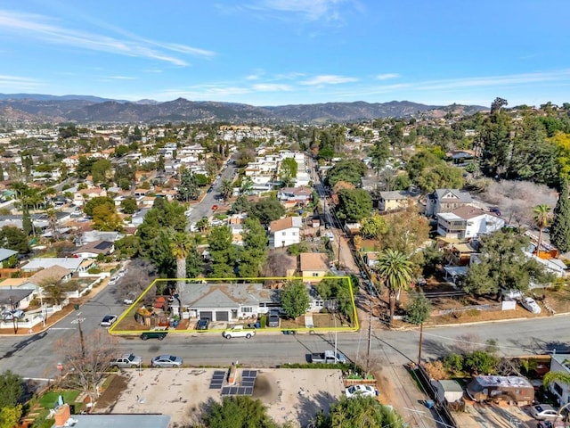 birds eye view of property with a residential view and a mountain view