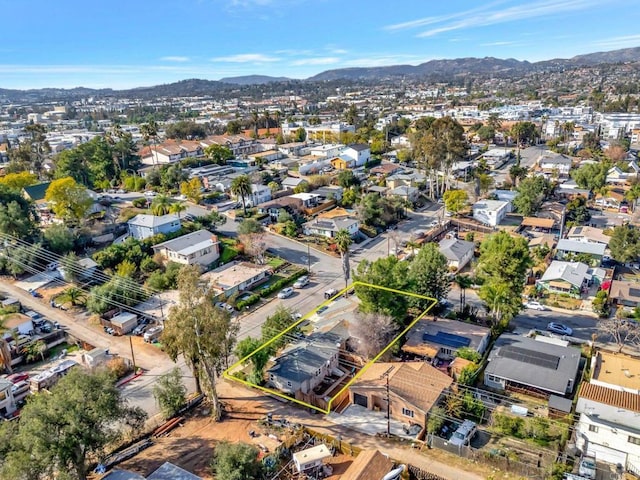 bird's eye view with a residential view and a mountain view