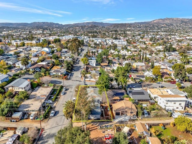 drone / aerial view with a residential view and a mountain view