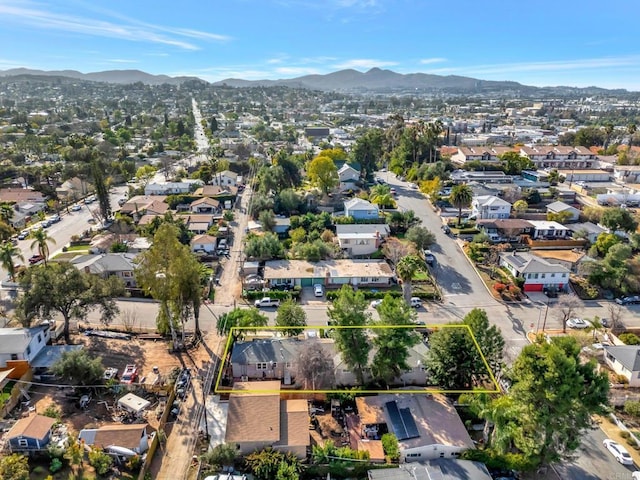 drone / aerial view with a residential view and a mountain view