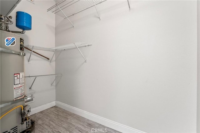 spacious closet with secured water heater