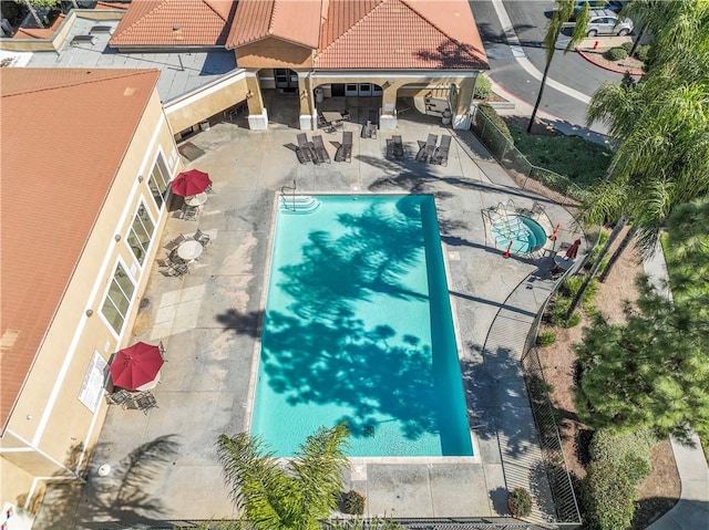 view of pool featuring a patio