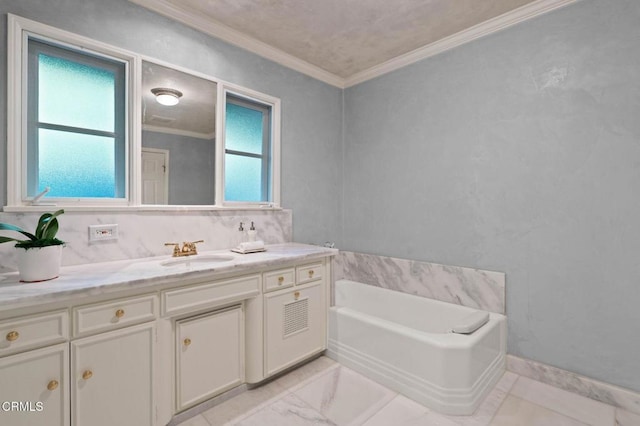 full bathroom featuring ornamental molding, a garden tub, and vanity