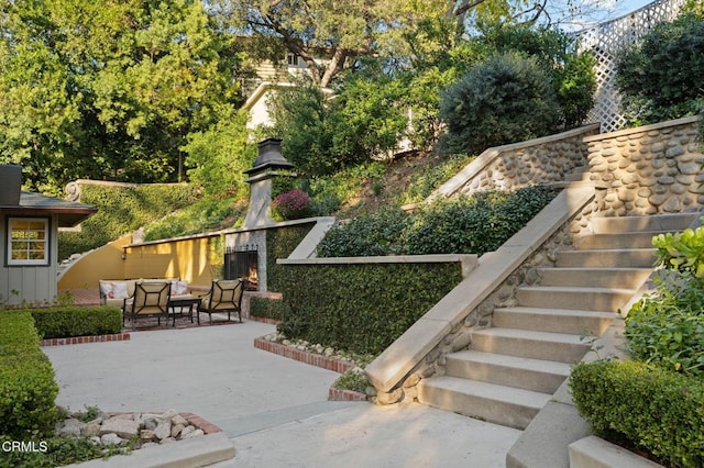 view of patio / terrace featuring stairs