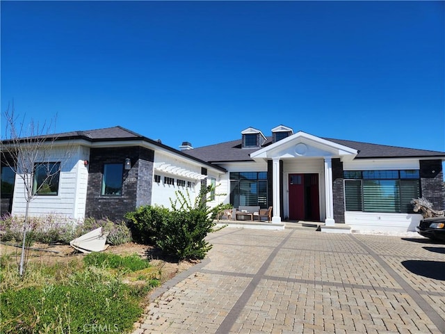 view of front of home featuring an attached garage