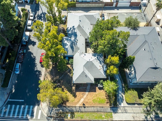 birds eye view of property with a residential view