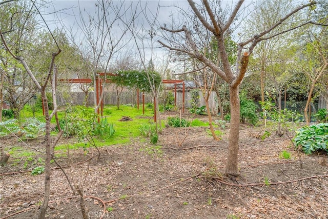 view of yard with fence