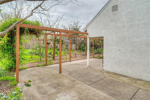 view of patio with a fenced backyard and a pergola