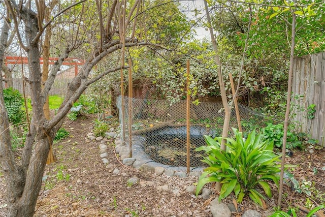 view of yard with fence