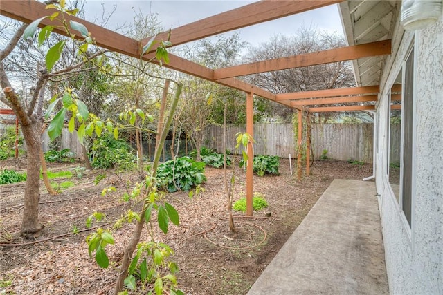 view of yard with a fenced backyard and a pergola