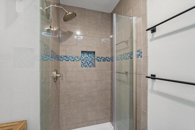 bathroom with a stall shower