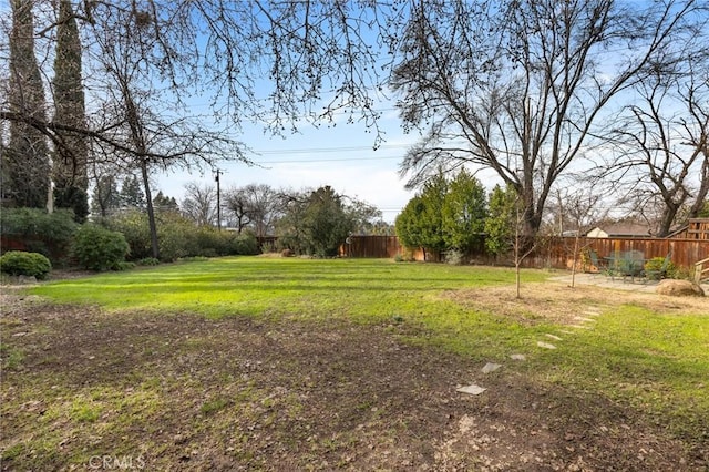 view of yard with fence