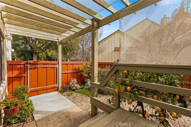 view of patio featuring a fenced backyard and a pergola