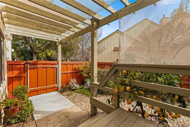 exterior space with fence and a pergola