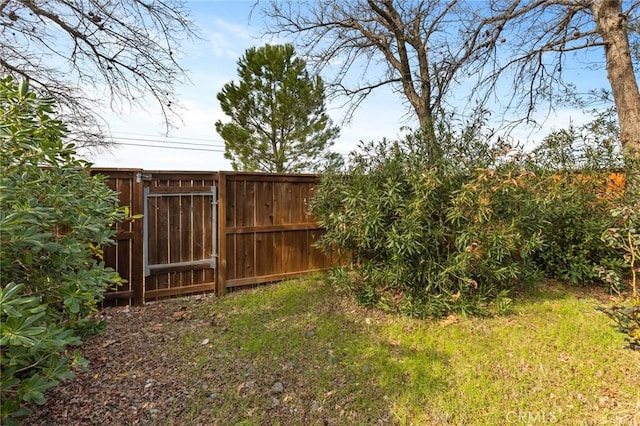 view of yard with fence