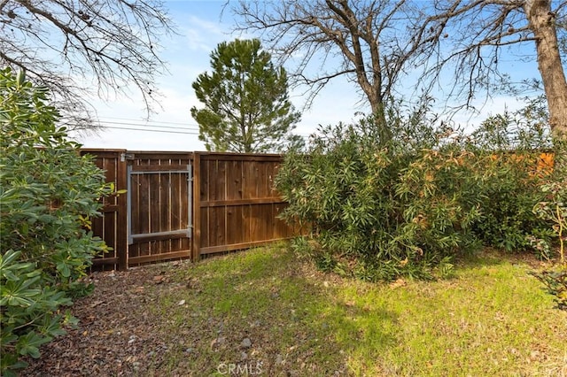 view of yard featuring fence