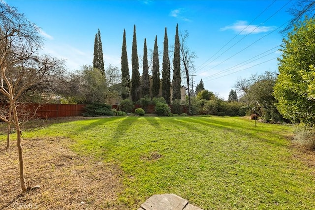 view of yard with fence